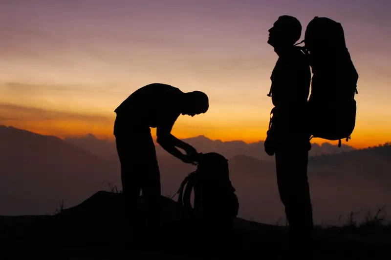 Backpacker Packing A Pack