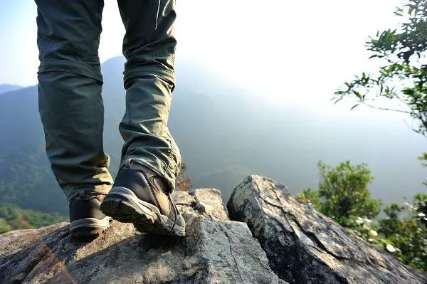 Hiker On Mountain Edge