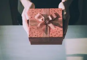 Person Giving a Gift