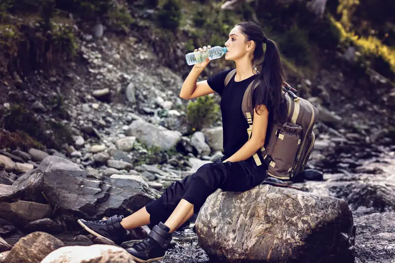 How Do You Carry a Water Bottle While Hiking?